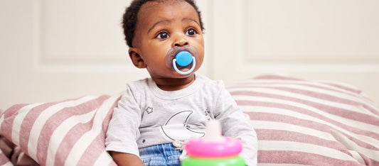 baby on nursing strike with pacifier in mouth